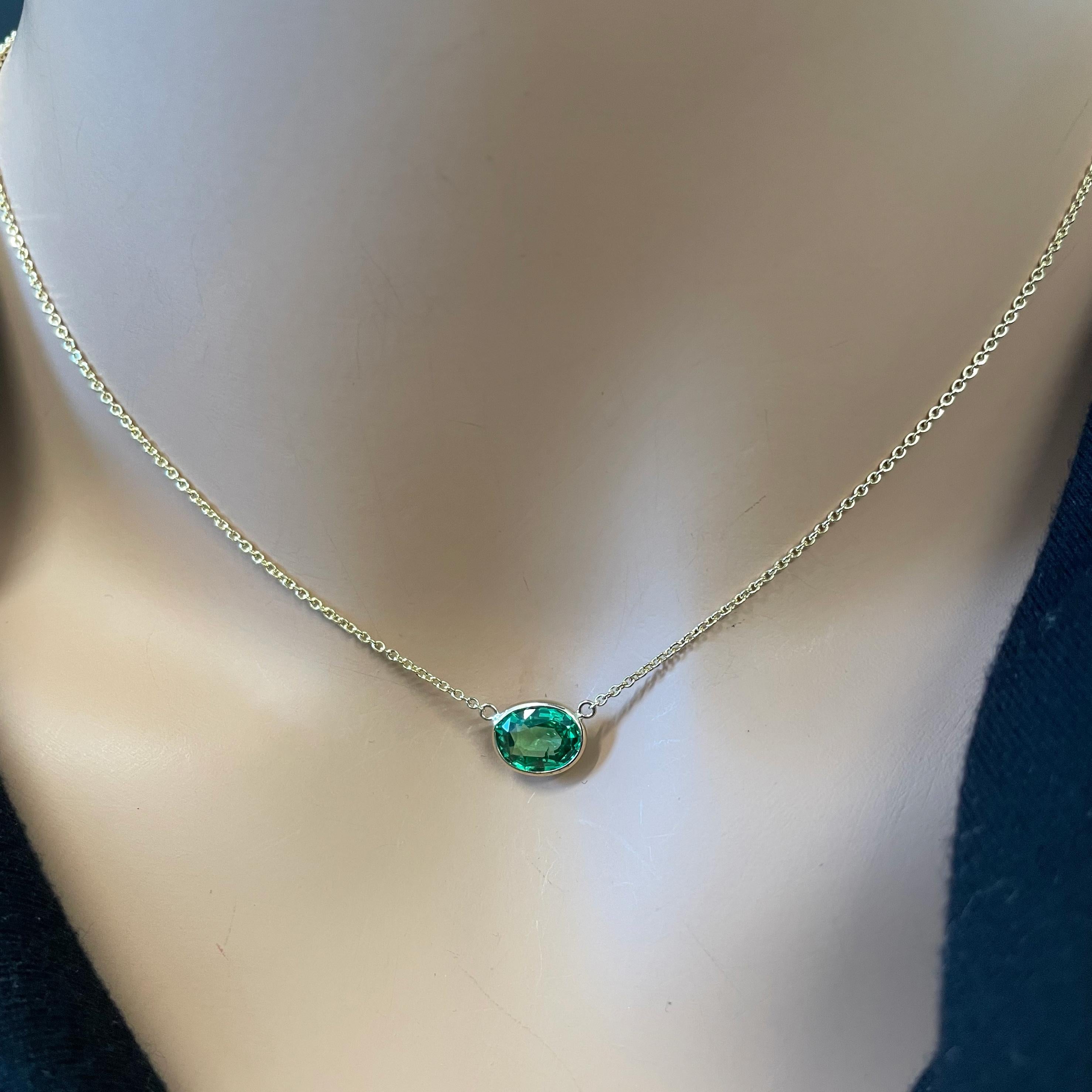 The 2.02 carat Oval Cut Green Tsavorite Necklace in 14K Yellow Gold is a captivating and elegant piece of jewelry that effortlessly combines natural beauty with timeless design. This necklace features a mesmerizing green Tsavorite gemstone,