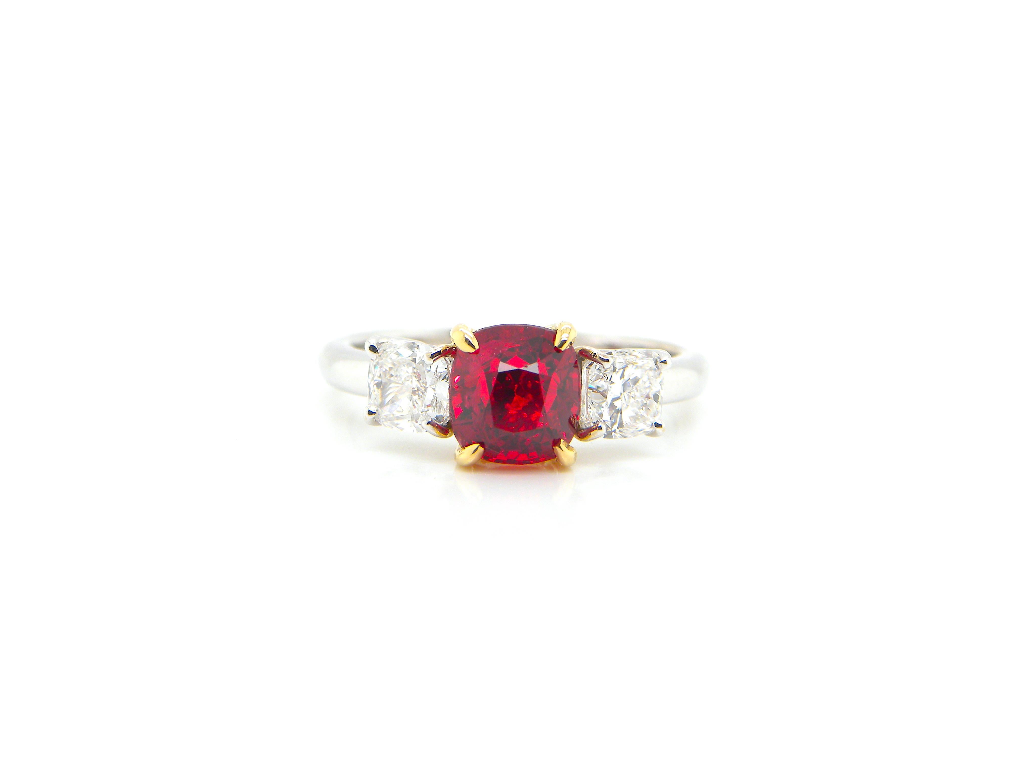 2.02 Carat GRS Certified Burma No Heat Vivid Red Spinel and White Diamond Ring:

A stunning ring, it features a beautiful and rare GRS certified cushion-cut Burmese unheated vivid red spinel weighing 2.02 carat flanked by two white cushion-cut