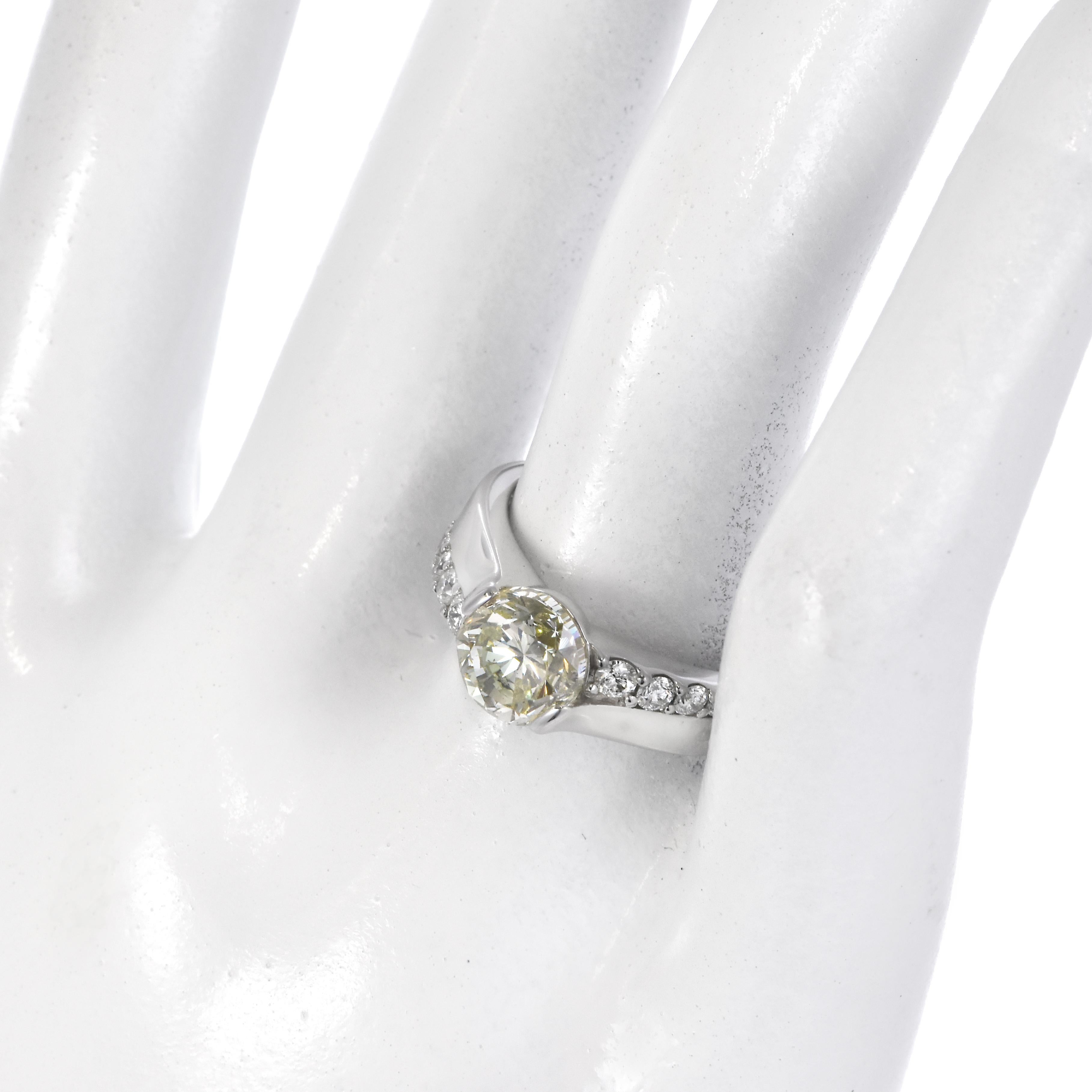 A beautiful ring featuring a CGL Certified 2.02 Carat Natural Very Light Yellow Diamond Ring made in Platinum. Diamonds have been adorned and cherished throughout human history and date back to thousands of years. They are rated as 10 on the Mohs