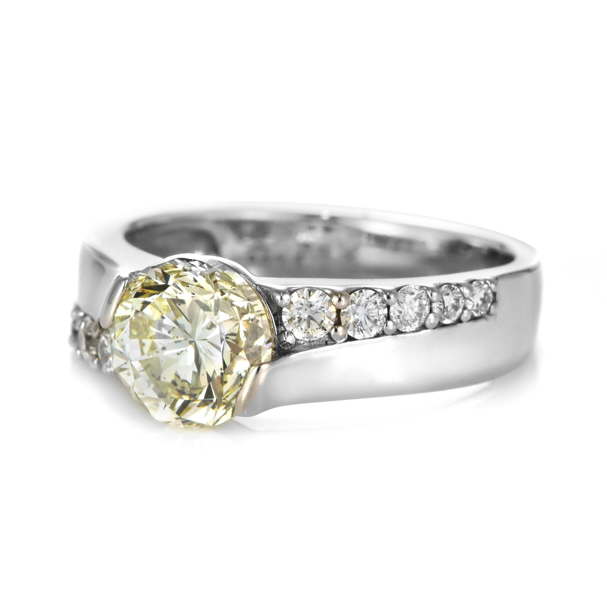 Modern 2.02 Carat Natural, Very Light Yellow, Diamond Ring Made in Platinum For Sale