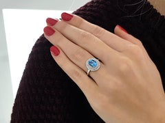2.02 Carat Oval Blue Topaz Diamond Halo 18 KT White Gold Engagement Ring