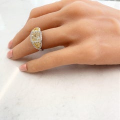 2.02 Carat Radiant Cut Fancy Light Yellow Diamond Ring in Platinum