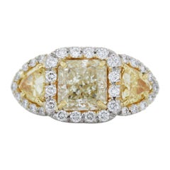 2.02 Carat Radiant Cut Fancy Light Yellow Diamond Ring in Platinum