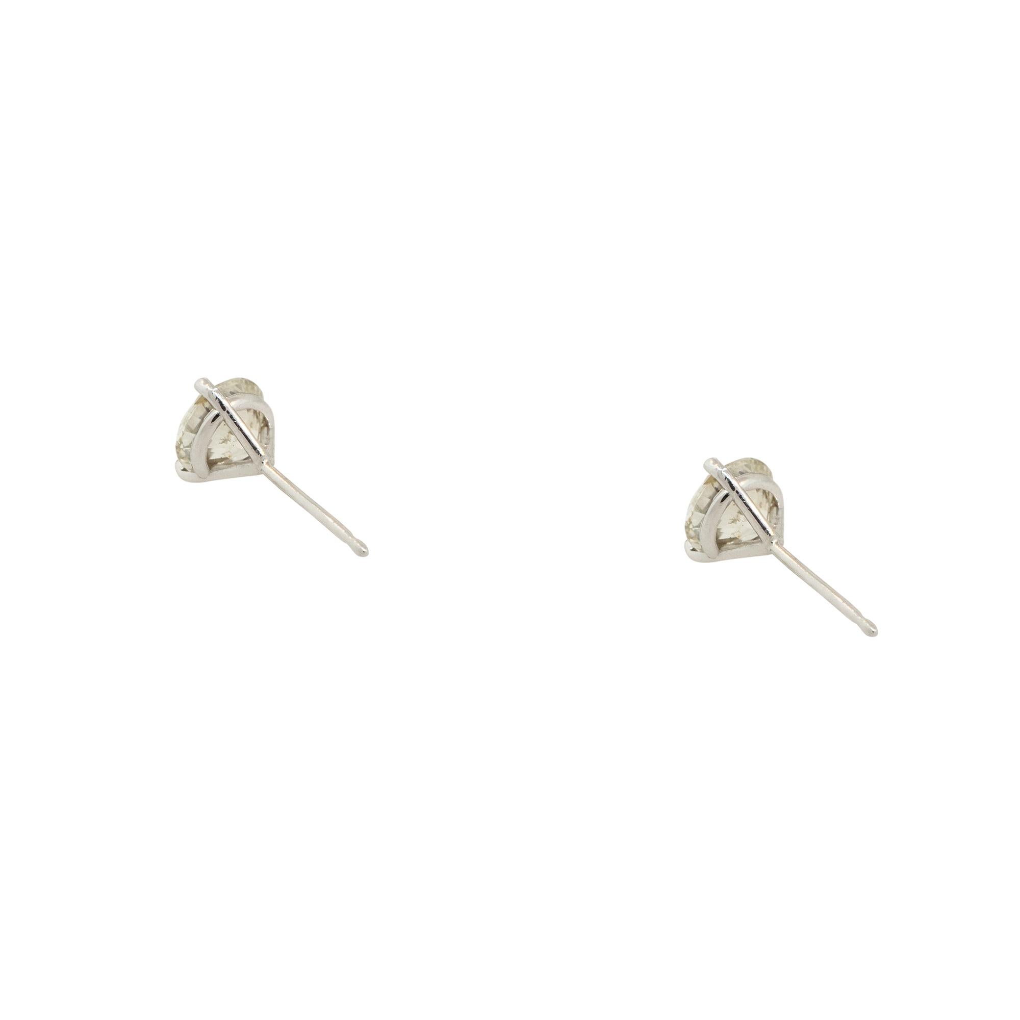 Material: 14k White Gold
Diamond Details: Approx. 2.02ctw of Round Cut Diamonds. Diamonds are K/L in color and SI1-I1 in clarity
Total Weight: 1.2g (0.7dwt)
Earring Backs: Friction Backs
Dimensions: 6.80mm x 15mm
Additional Details: This item comes