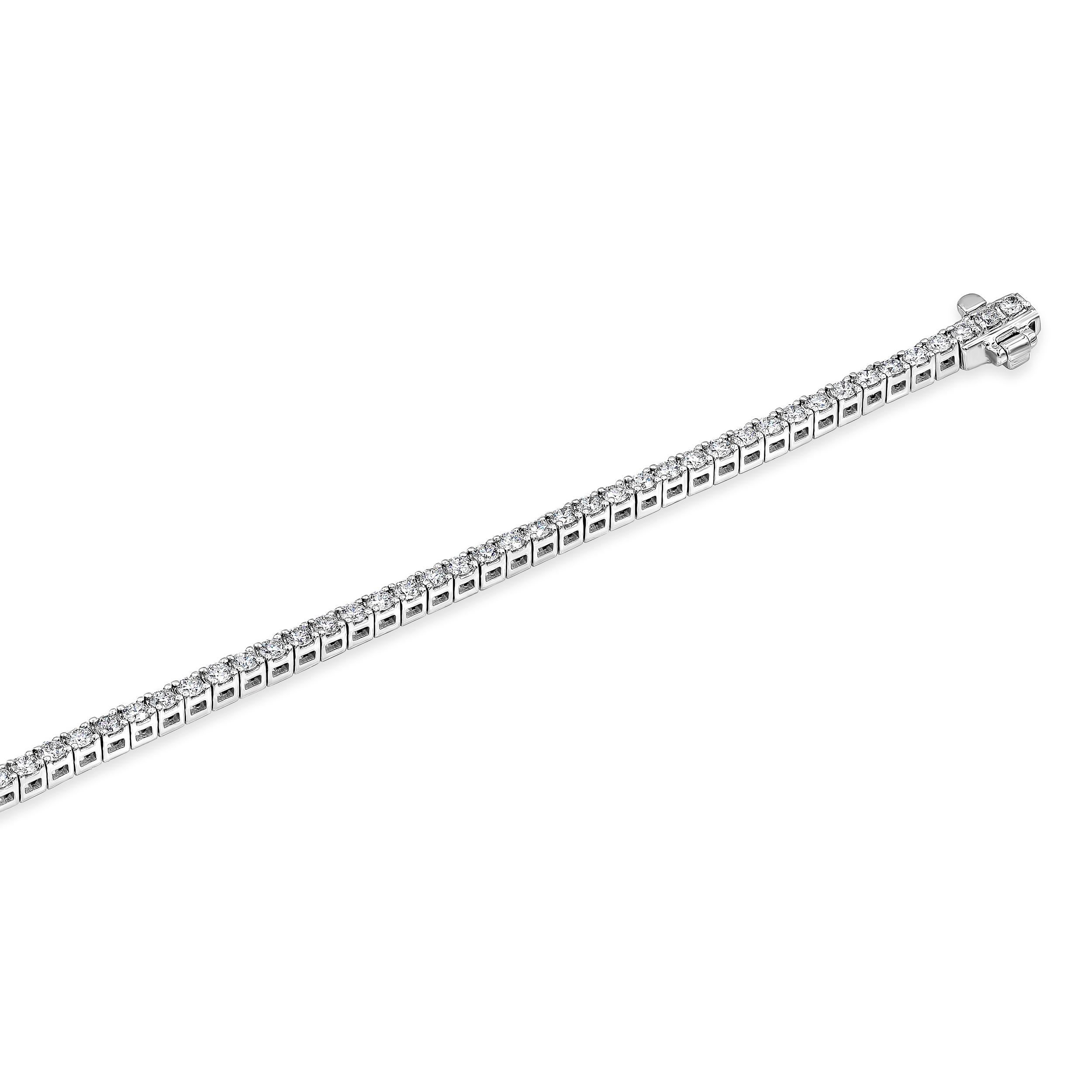 A classic tennis bracelet style showcasing a row of round brilliant diamonds, set in a 14 karat white gold setting. Diamonds weigh 2.02 carats total. 

Style available in different price ranges. Prices are based on your selection of the 4C’s (Carat,