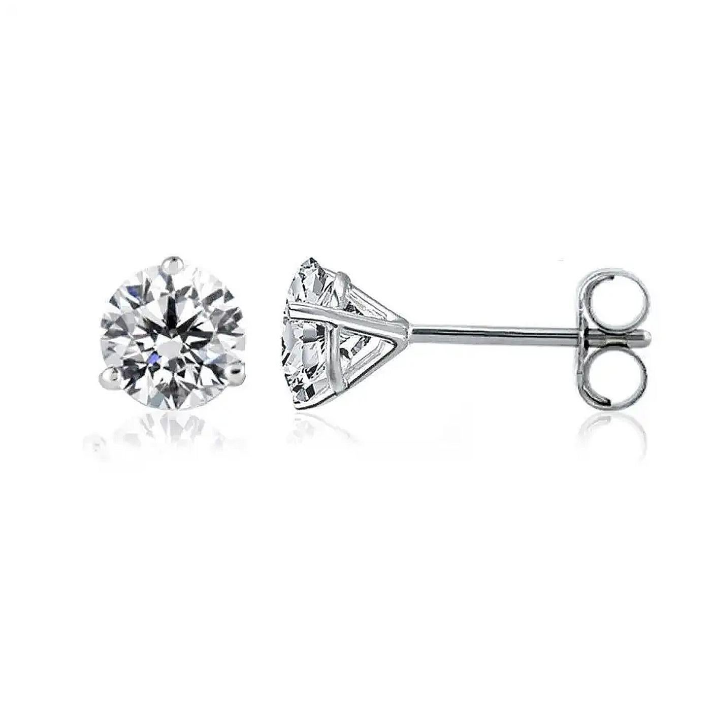 These Four-Prong Martini Style Earrings in Platinum are set with your choice of perfectly matched diamonds.
An attractive alternative to traditional stud earrings, martini settings lend all of their glory to the featured diamond within. The