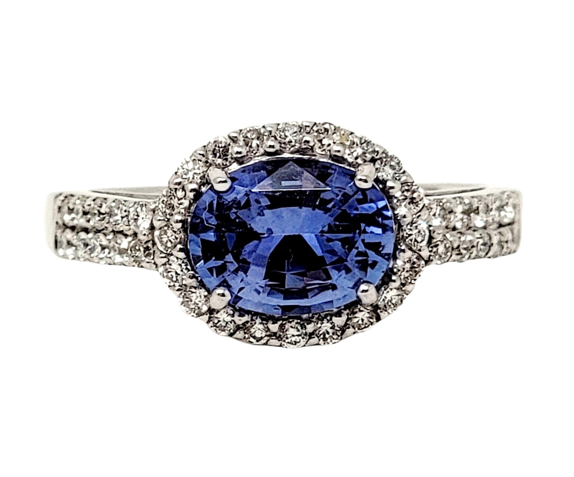 Ring size: 7

Absolutely gorgeous sapphire and diamond ring. Modern, elegant and romantic, this shimmering beauty absolutely wows. Featured at the center is an oval mixed cut natural ceylon sapphire prong set in white gold. The striking blue color