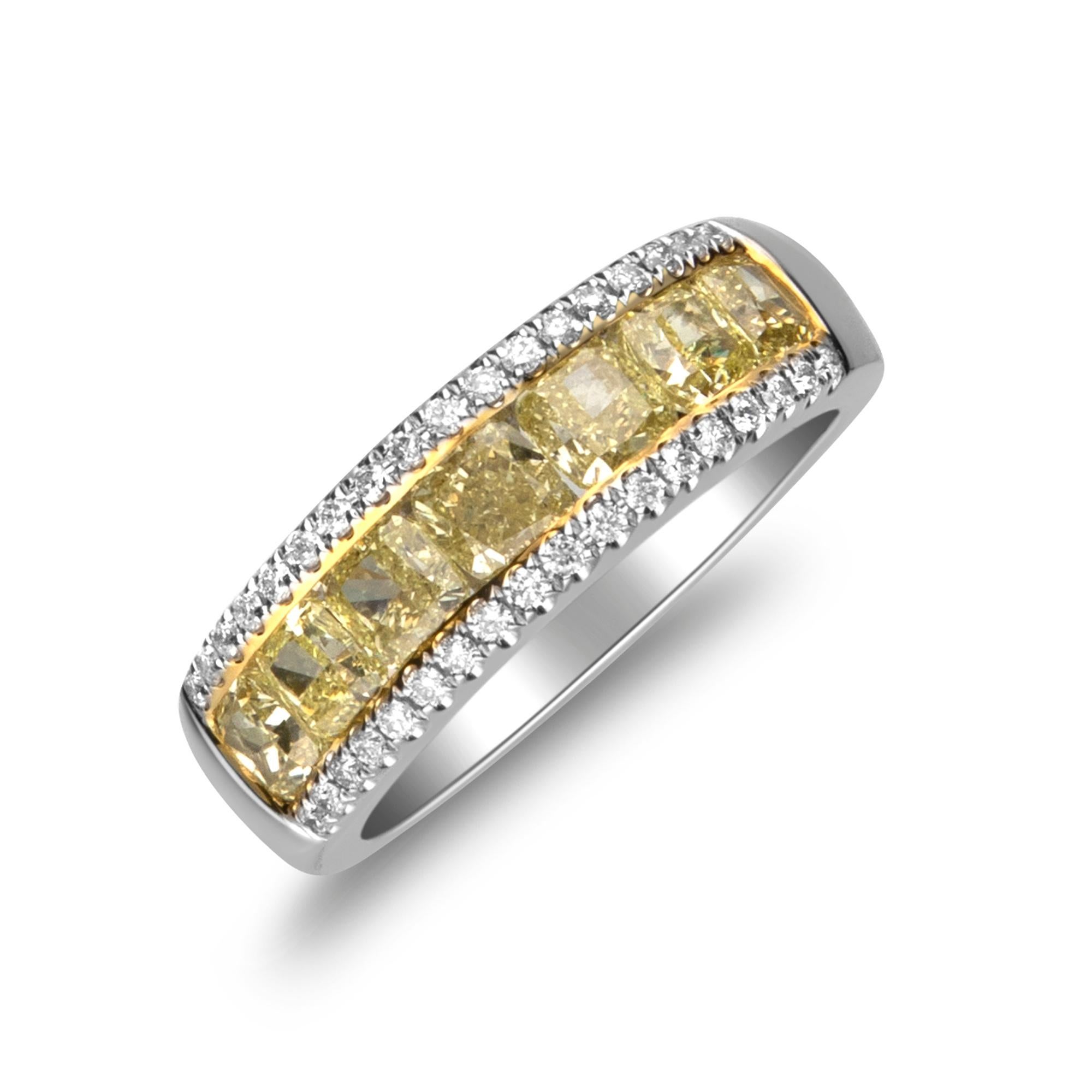 This one of a kind band ring is crafted in 14-karat Two Tone gold and features seven cushion cut Yellow Diamonds 2.02 carats & 36 Round Diamonds 0.22 carat in SI quality. This ring comes in size 7 this ring is a perfect gift either for yourself or