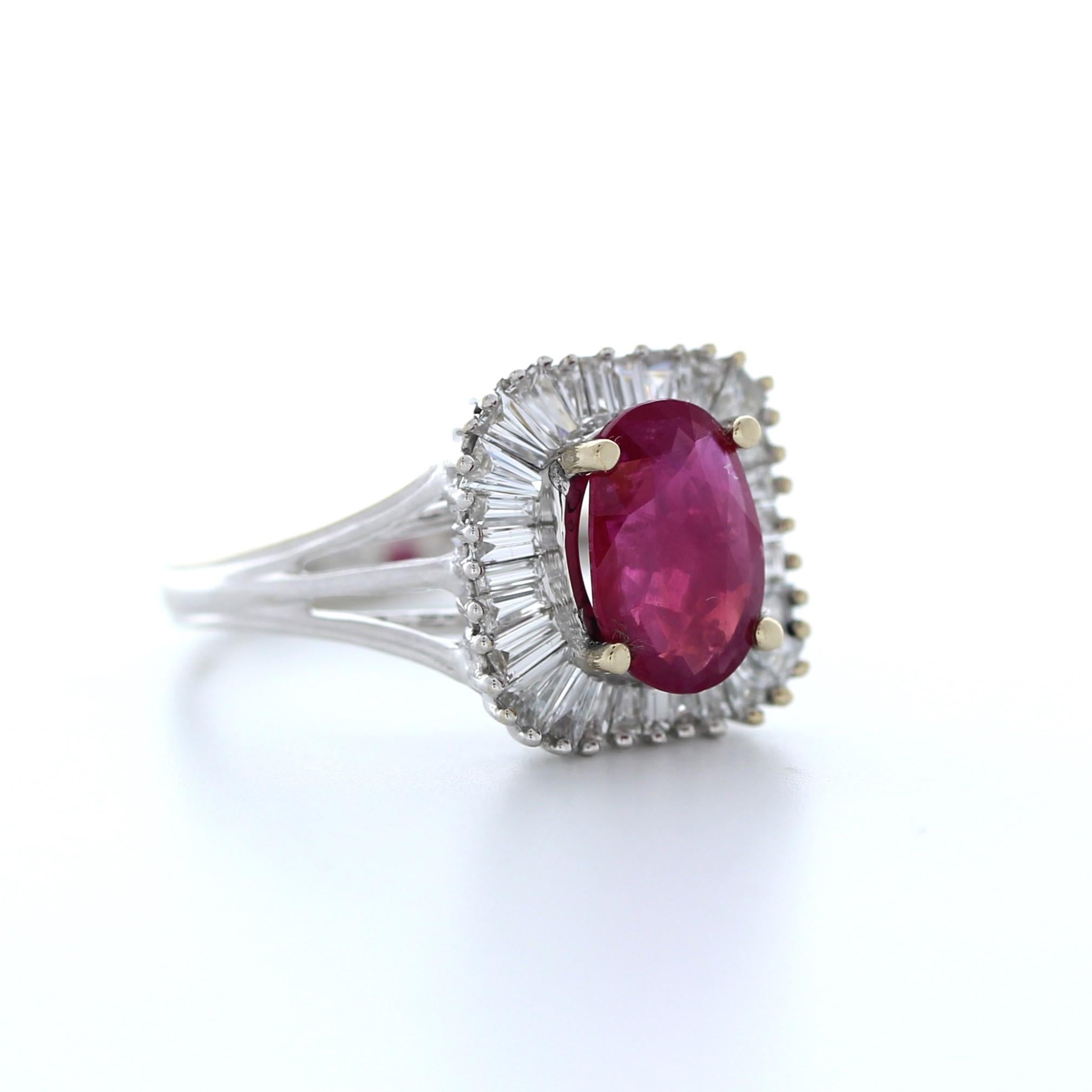 Make a bold statement with this stunning 2.02 carat weight oval shape ruby fashion ring. The vivid red hue of the ruby is truly captivating, and the oval cut allows it to reflect light beautifully. The ruby is set in luxurious 18K white gold and is