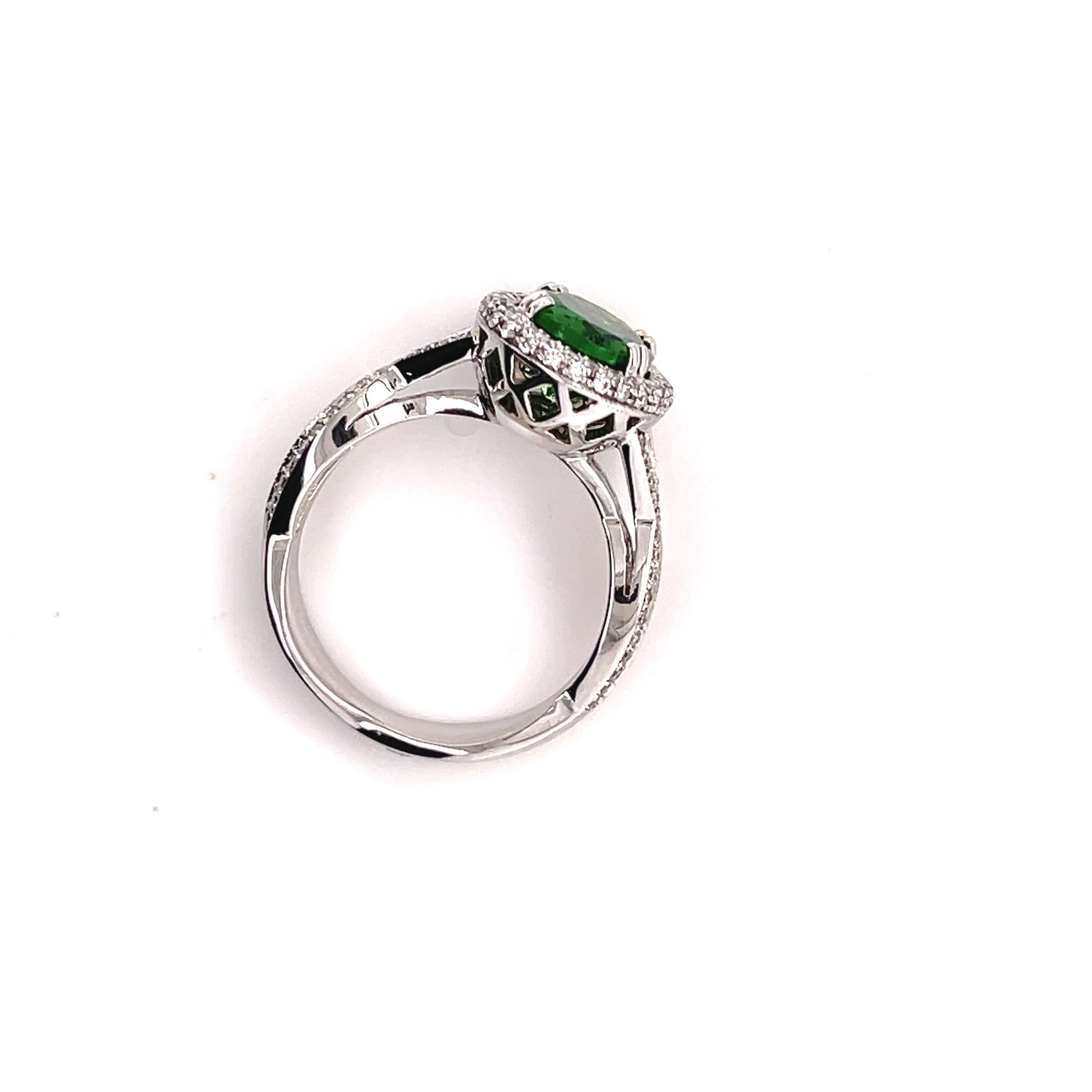 Green Garnets (Tsavorites) clean and in lager size have become harder to get. This oval cut Tsavorite is 2.02 carats, it is VS grade and cut by Bill Vance.  We decided to make the ring in 14-karat white gold and accent it with small  Diamonds,  112