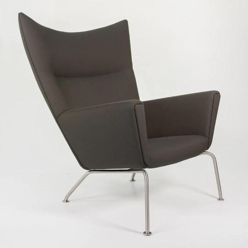 2020 CH445 Wing Lounge Chair by Hans Wegner for Carl Hansen in Brown/Grey Fabric In Good Condition For Sale In Philadelphia, PA