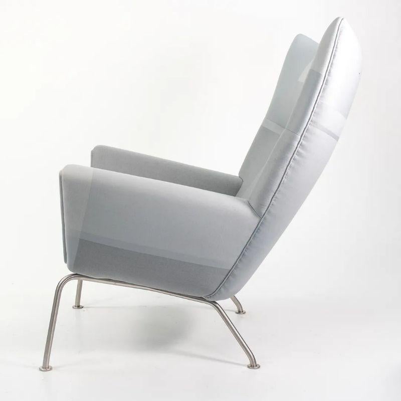 Stainless Steel 2020 Carl Hansen & Son CH445 Wing Lounge Chair and CH446 Ottoman by Hans Wegner For Sale