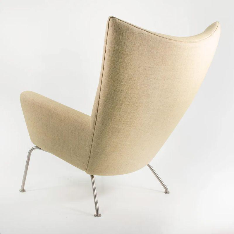 Danish 2020 CH445 Wing Lounge Chair by Hans Wegner for Carl Hansen in Yellow Fabric For Sale