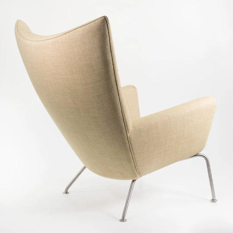 2020 CH445 Wing Lounge Chair by Hans Wegner for Carl Hansen in Yellow Fabric In Fair Condition For Sale In Philadelphia, PA
