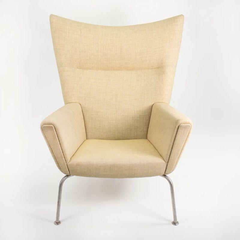 2020 CH445 Wing Lounge Chair by Hans Wegner for Carl Hansen in Yellow Fabric For Sale 1