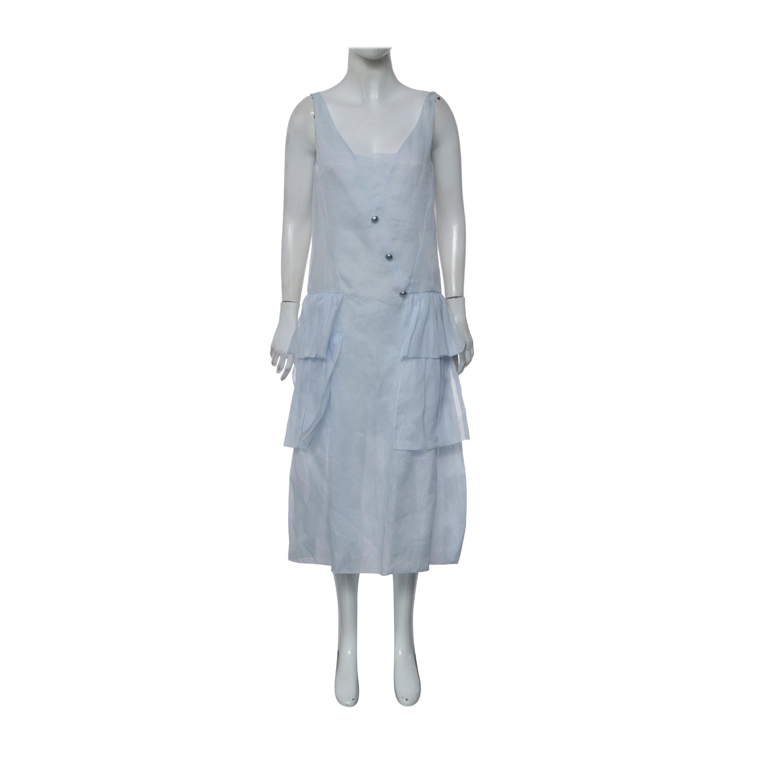 Chanel organza-like dress from 2021 collection. In brand new and unworn condition with the tag attached. Comes with extra button. Simple yet elegant design. Retails for est. $7000. 100% Cotton.