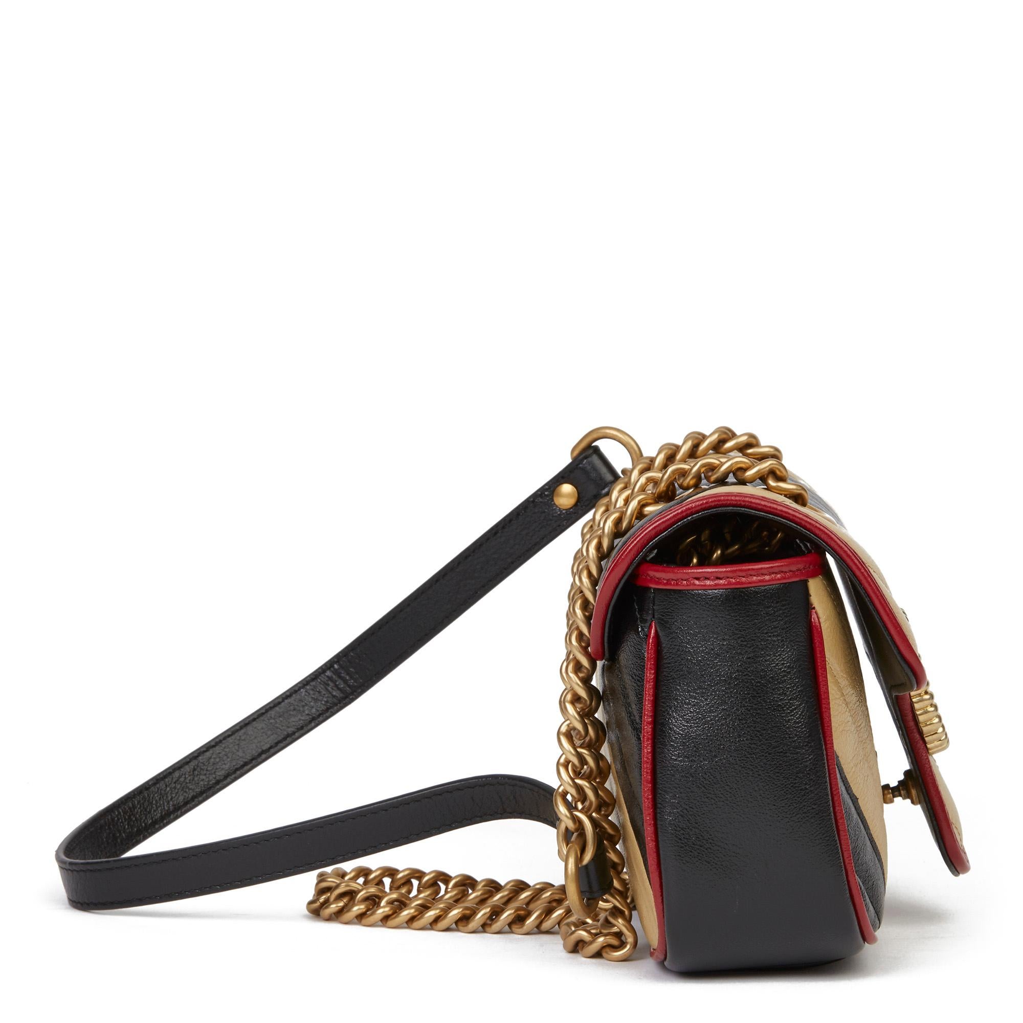 GUCCI
Black, Cream & Red Diagonal Quilted Aged Calfskin Leather Mini Marmont

Xupes Reference: HB3535
Serial Number: 446744 493075
Age (Circa): 2020
Accompanied By: Gucci Dust Bag, Care Booklet
Authenticity Details: Serial Stamp (Made in