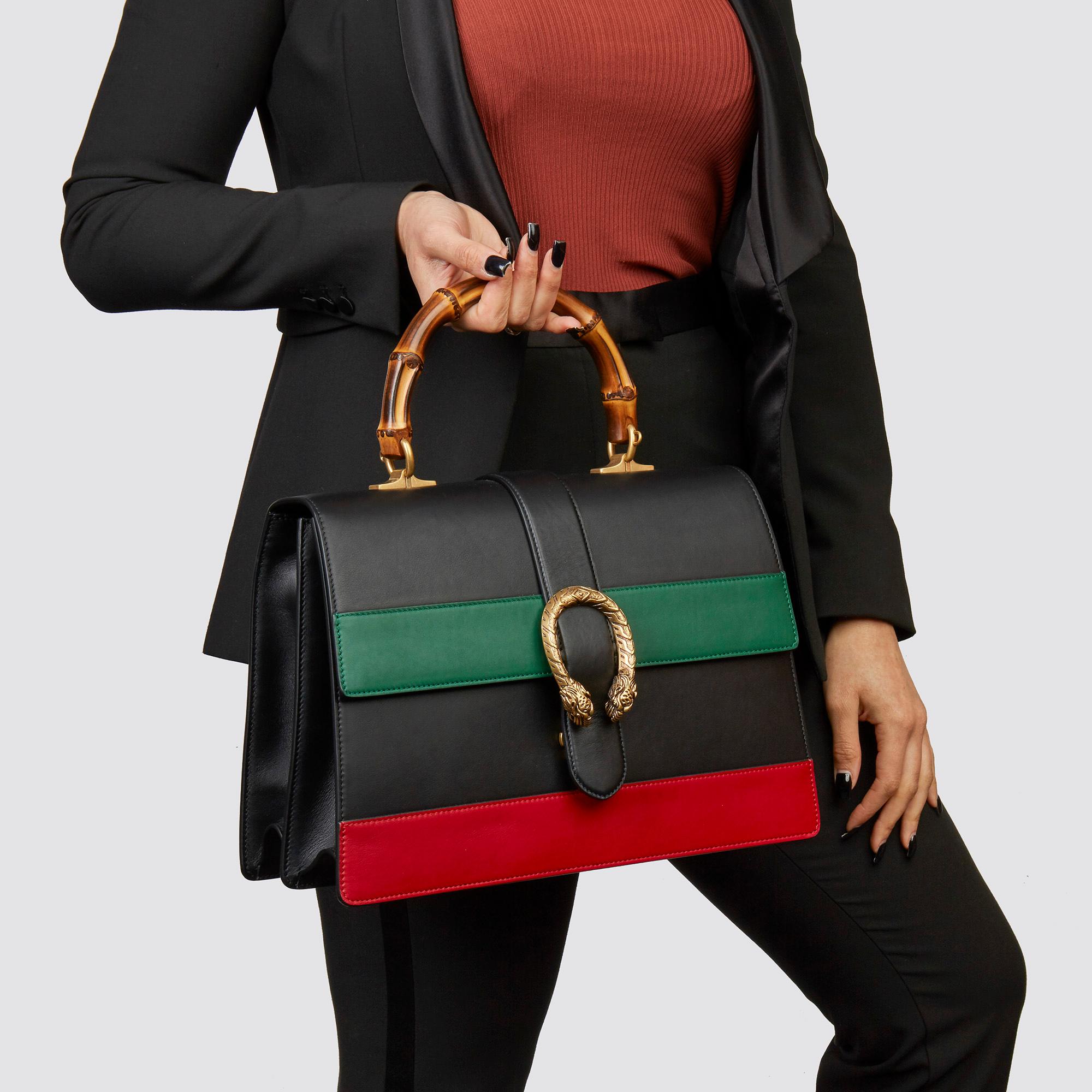 GUCCI
Black, Green & Red Smooth Calfskin Leather Large Dionysus Bamboo Top Handle 

Xupes Reference: HB3607
Serial Number: 421999 001998
Age (Circa): 2020
Accompanied By: Gucci Dust Bag, Care Booklet, Leather Shoulder Strap, Canvas Sports Strap