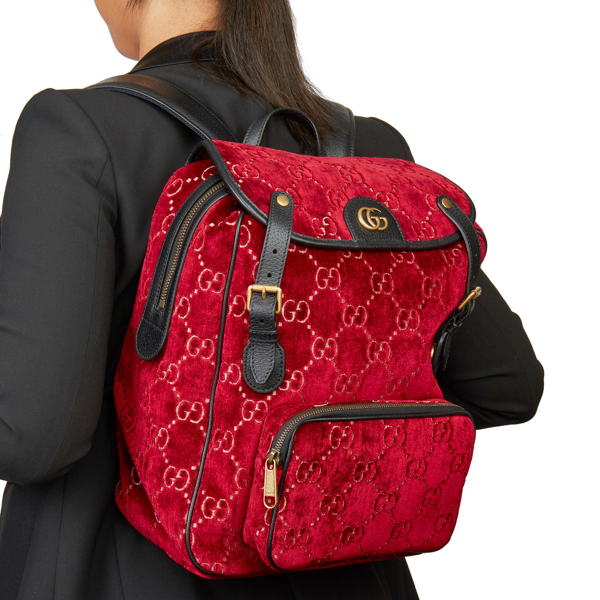 GUCCI
Red GG Velvet & Black Pigskin Small Marmont Backpack

Xupes Reference: HB3605
Serial Number: 574942 213317
Age (Circa): 2020
Accompanied By: Gucci Dust Bag, Care Booklet 
Authenticity Details: Date Stamp (Made in Italy)
Gender: Ladies
Type: