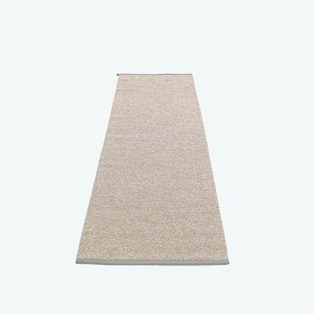 This is a Terrazzo Runner woven with pure wool and linen in shades of blue and gold. The rug was designed by Gunilla Lagerhem Ullberg and produced by Kasthall in Sweden. It dates to circa 2020 and is guaranteed as authentic. Condition is very good
