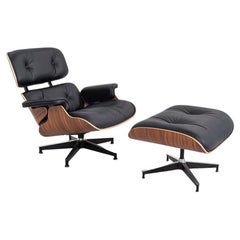 2020 Herman Miller Eames Lounge Chair and Ottoman in Black Leather and Walnut