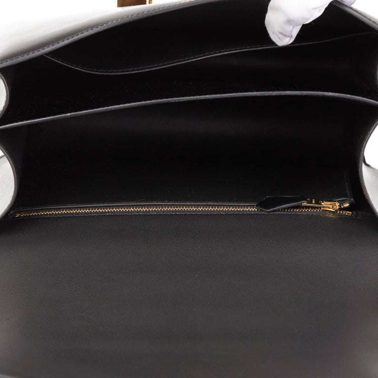 HERMÈS, BLACK BOX LEATHER CONSTANCE 23 WITH GOLD HARDWARE, Luxury  Handbags, 2020