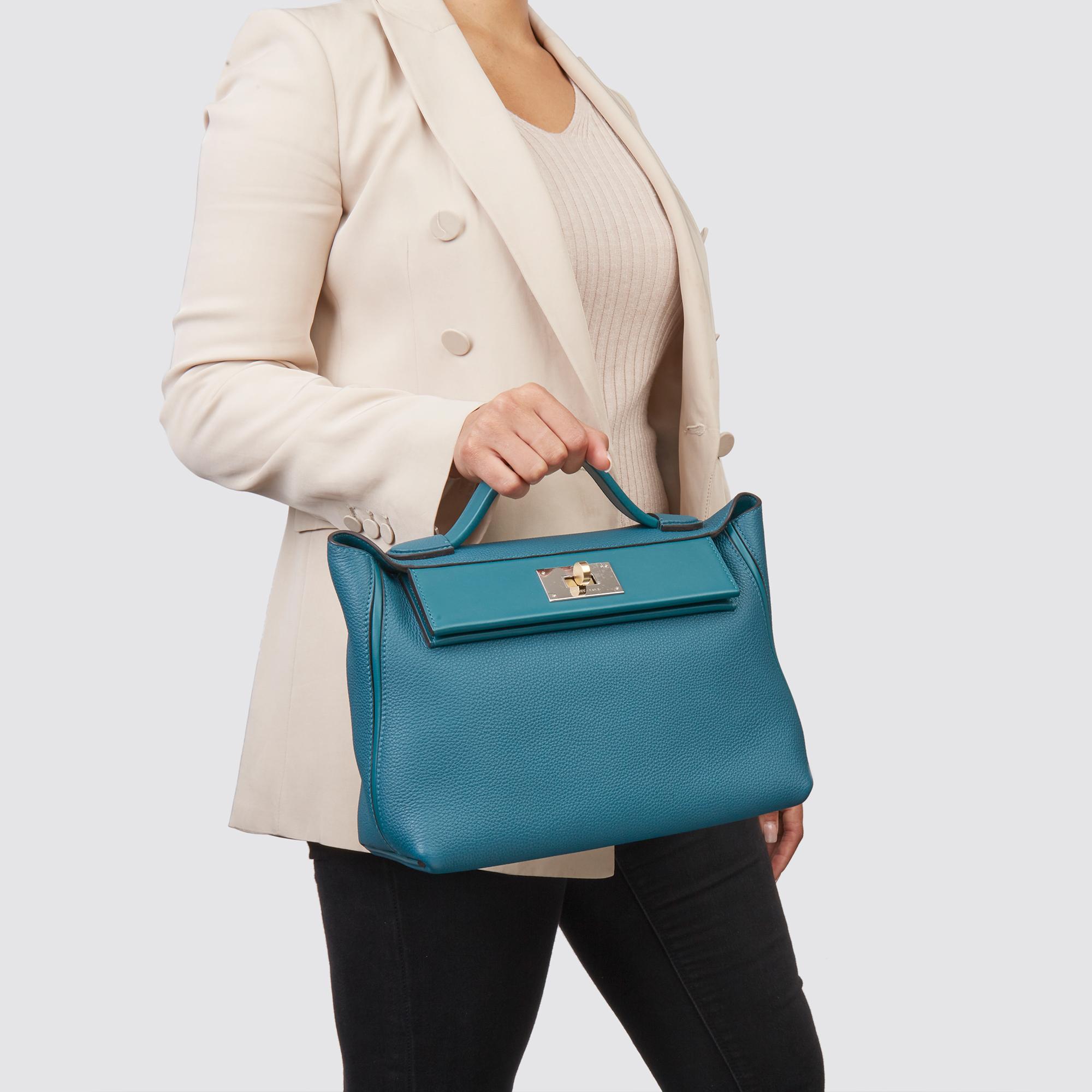 HERMÈS
Vert Bosphore Togo & Swift Leather Leather 24/24 29cm

Serial Number: Y
Age (Circa): 2020
Accompanied By: Hermès Dust Bag, Box, Strap, Protective Felt, Care Booklet
Authenticity Details: Date Stamp (Made in France) 
Gender: Ladies
Type: Top