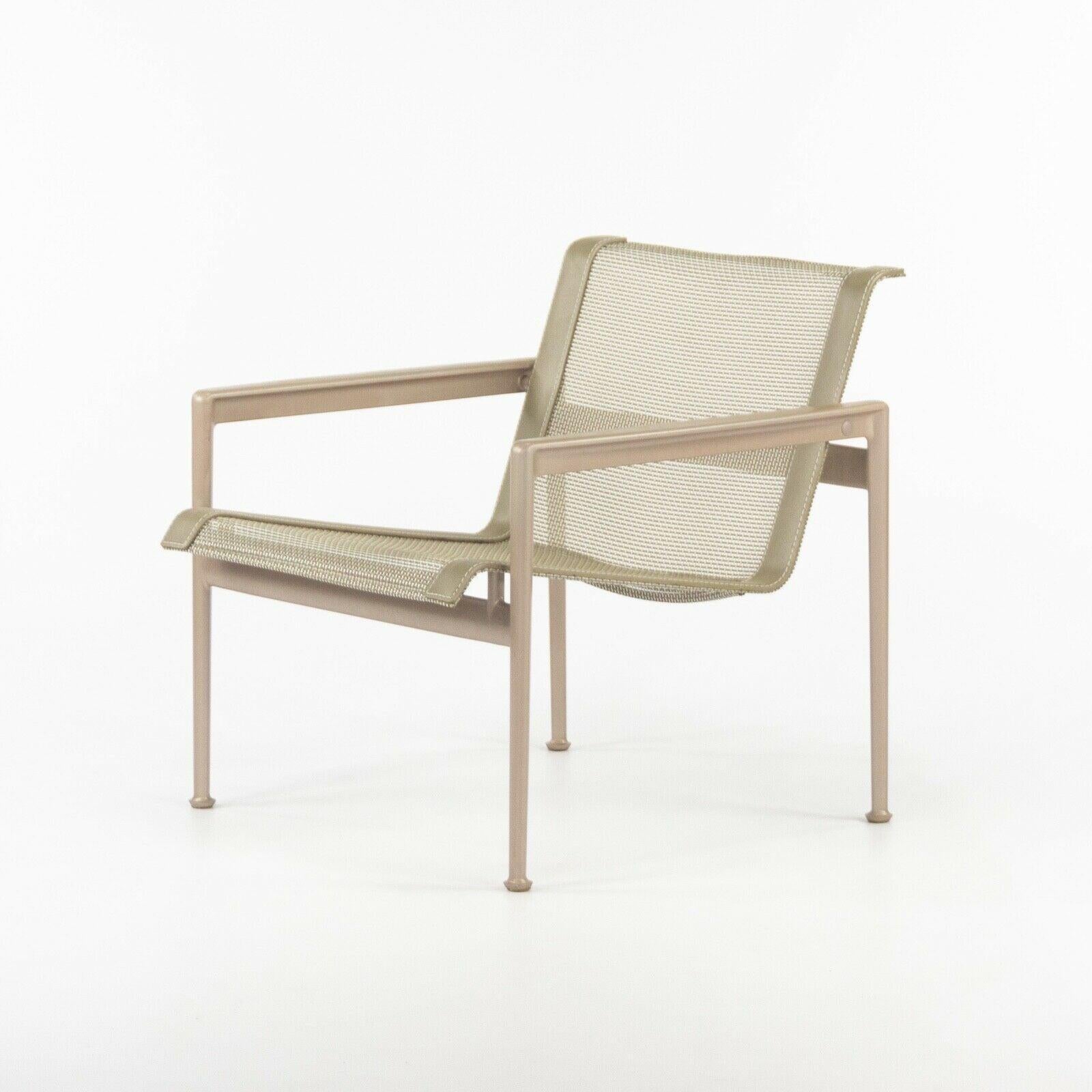 Listed for sale is a 2020 production lounge chair with arms designed by Richard Schultz and produced by Knoll. This is a unique example with beige powder coated frame and beige sling as well. The chair is in excellent condition with few if any signs