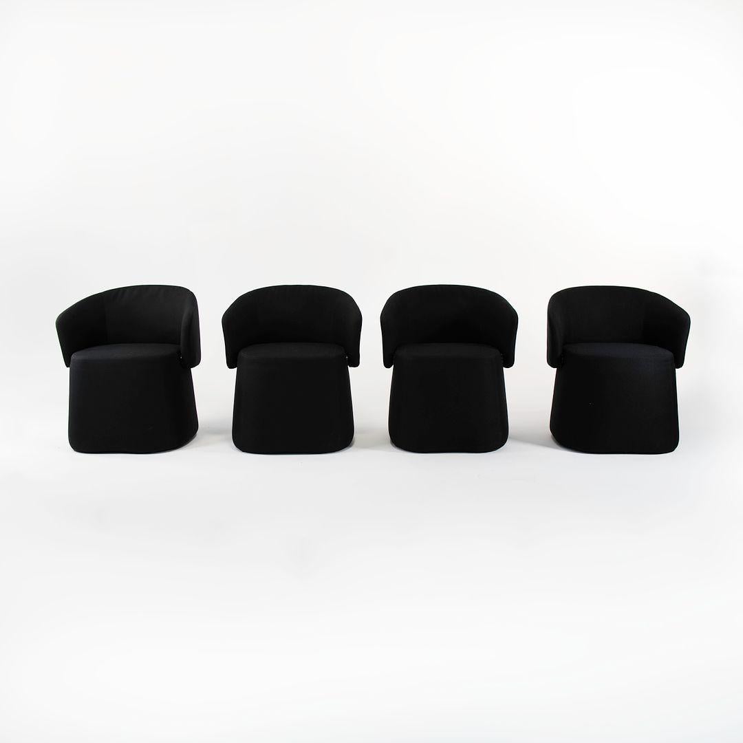 This is an Openest Chick convertible pouf chair, designed by Patricia Urquiola for Hayworth. The original upholstery is done in a shade of dark gray. The listed price includes one pouf, and we have four available for individual purchase. These