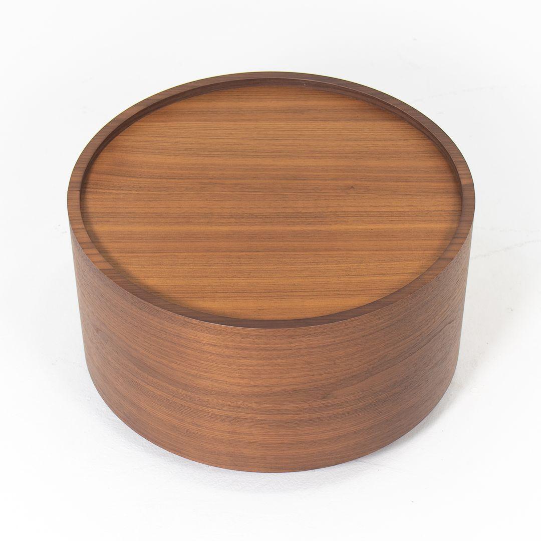 This is a single Dedalo table (two are available, but sold separately), designed and manufactured by Pianca Studio in Italy. These contemporary tables were produced in 2020. They have a Canaletto walnut veneer finish, and sport a solid plinth base.