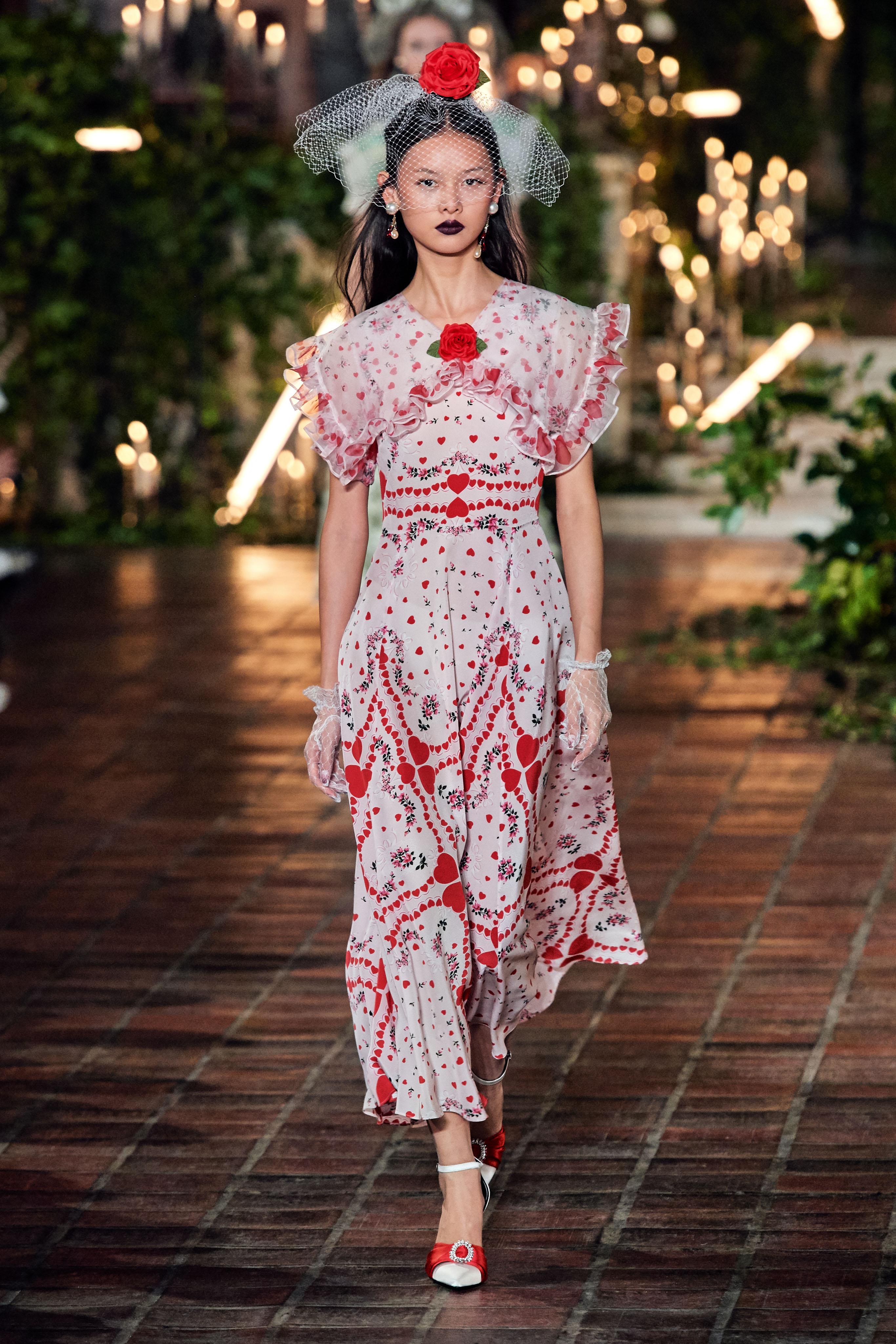 This playful Rodarte gown walked the runway as Look 12/51 in the brand’s Fall 2020 collection. The Vogue review stated that, with the arrival of this saccharine dress, “the show took a turn for the lurid, and ingeniously did so by doubling down on
