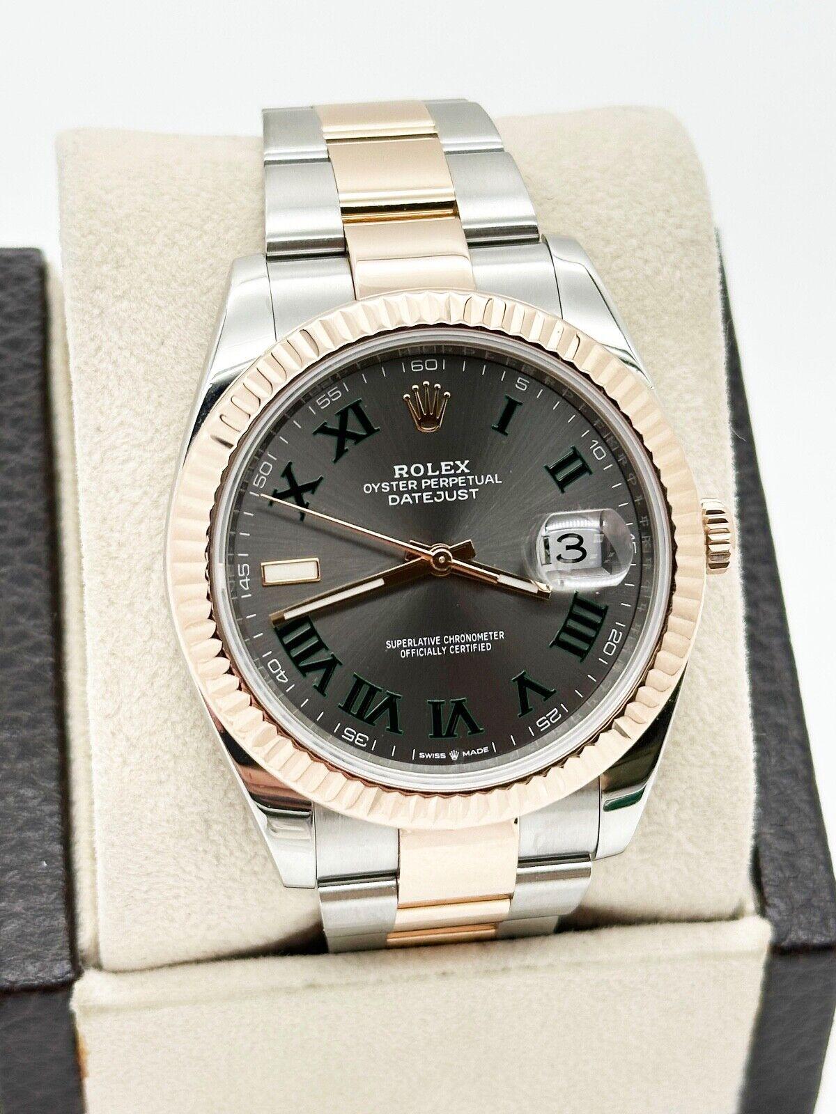 Style Number: 126331

Serial: 3Z370***

Year: 2020
 
Model: Datejust 41
 
Case Material: Stainless Steel
 
Band: 18K Rose Gold & Stainless Steel
 
Bezel: 18K Rose Gold
 
Dial: Wimbledon 
 
Face: Sapphire Crystal
 
Case Size: 41mm
 
Includes: 
-Rolex