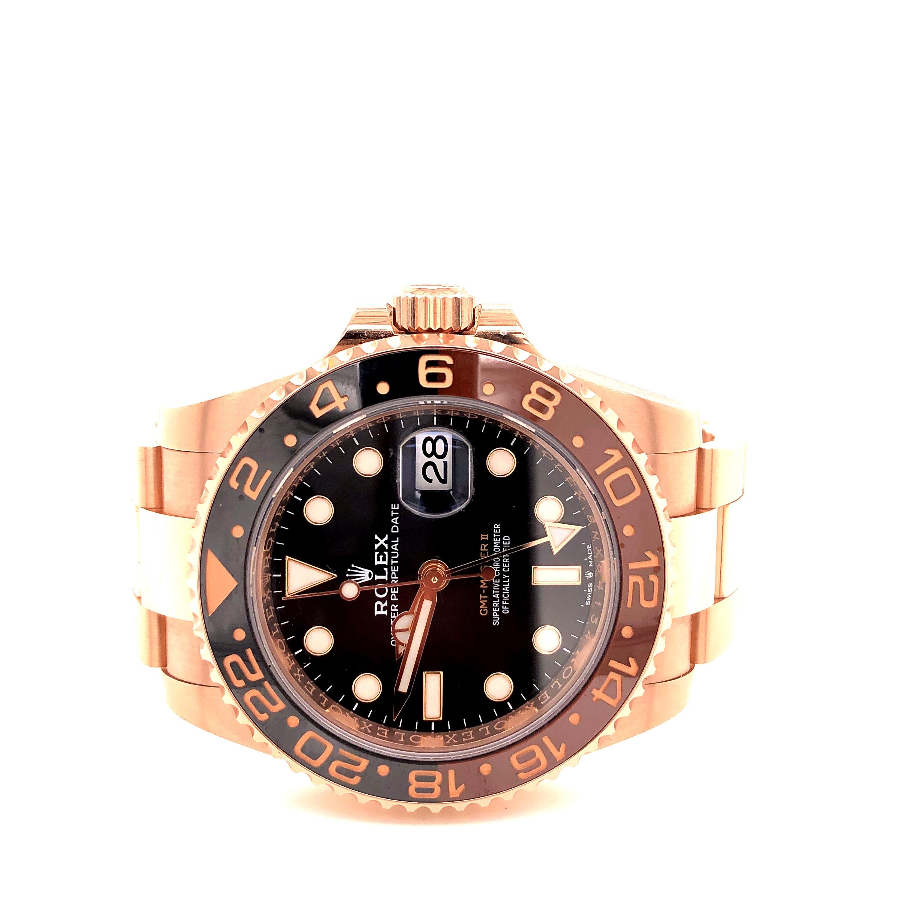 Rolex GMT-Master II (126715CHNR) self-winding automatic watch, features a 40mm Everose gold case with a black and brown 