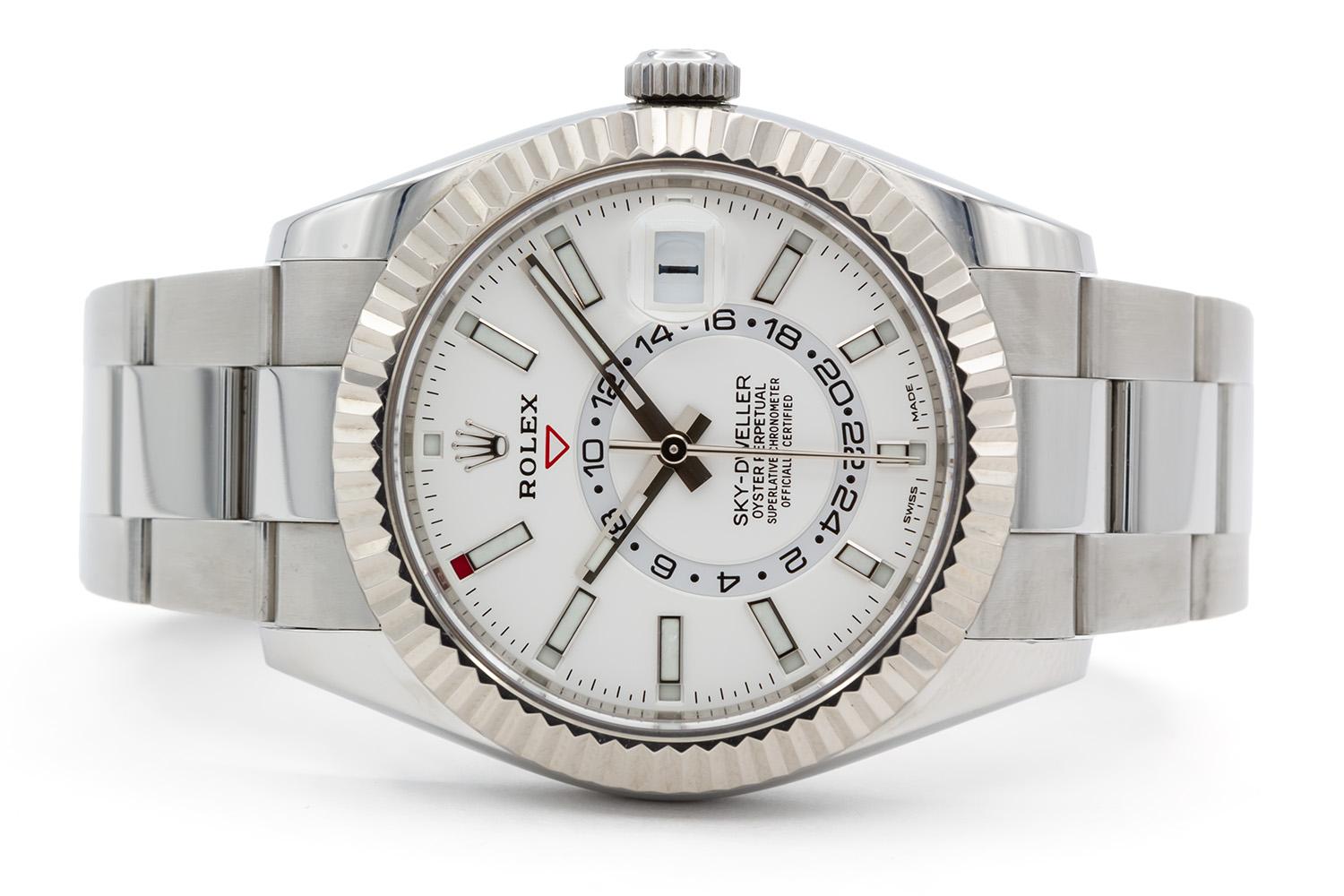 We are pleased to offer this 2020 Rolex Sky-Dweller 326934 With Box & Papers. As we're sure you know stainless steel Rolex models are quite hard to find these days. This collectible mens watch features a stunning white dial, stainless steel 42mm