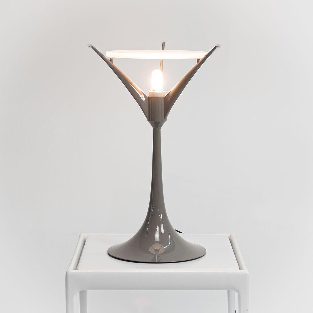 Listed for sale is a Spun Light T1 table lamp with a spun metal frame and aluminum diffuser. The lamp was designed by Sebastian Wrong, produced by Flos¬†in Italy. It dates to circa 2020 and is guaranteed authentic.¬†Condition is very good to