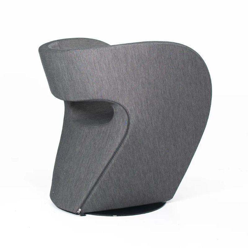 This is a Victoria & Albert Armchair, designed by Ron Arad for Moroso in 2000. This particular example dates to 2020, and has seen little use, as it was acquired for staging in a model unit in NYC. This chair was named as such as a tribute to the