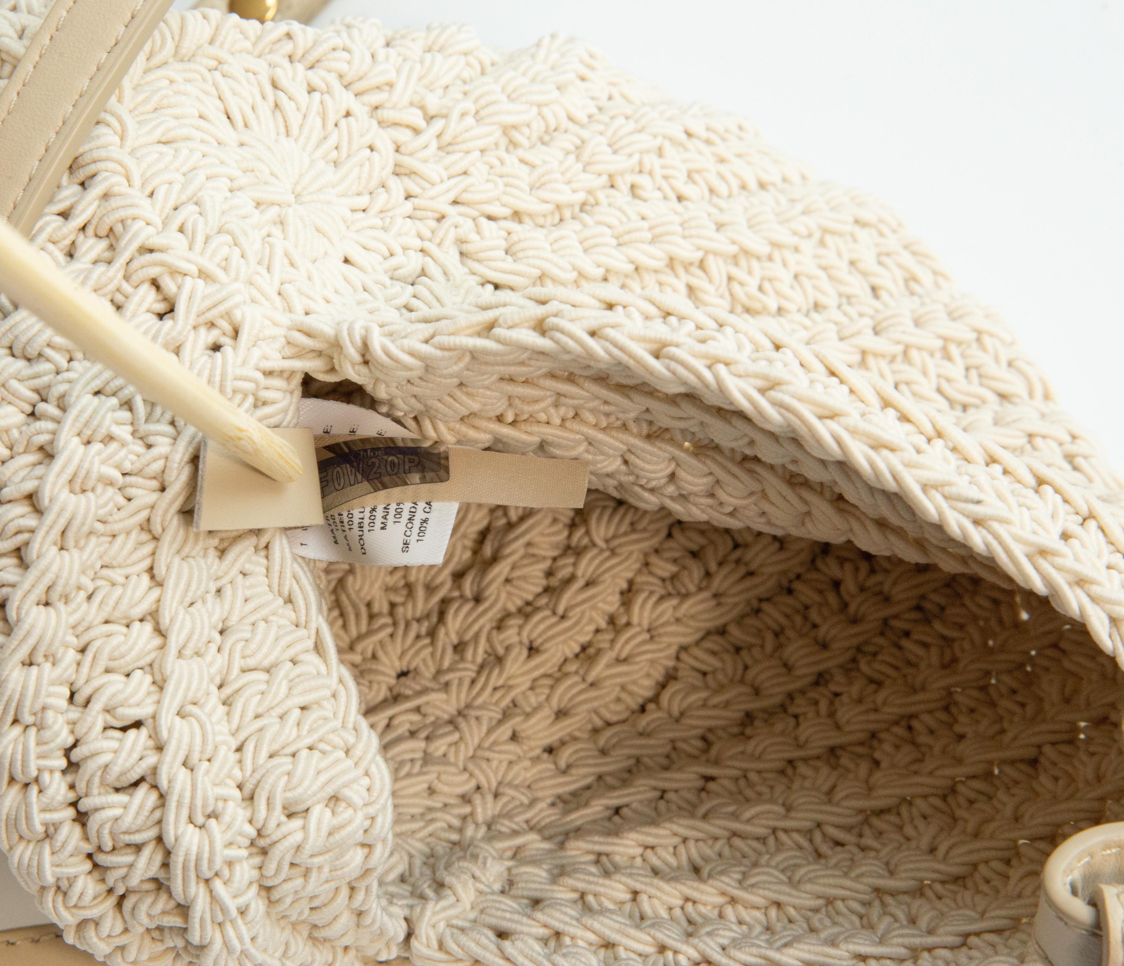 Chloe Sea Treasure's bag hand-crocheted  in a form of a shell. The bag features a beige leather adjustable strap and it can be worn as a shoulder bag or as a cross body (max length 120 cm).  The hardware is gold toned. It will be delivered with the