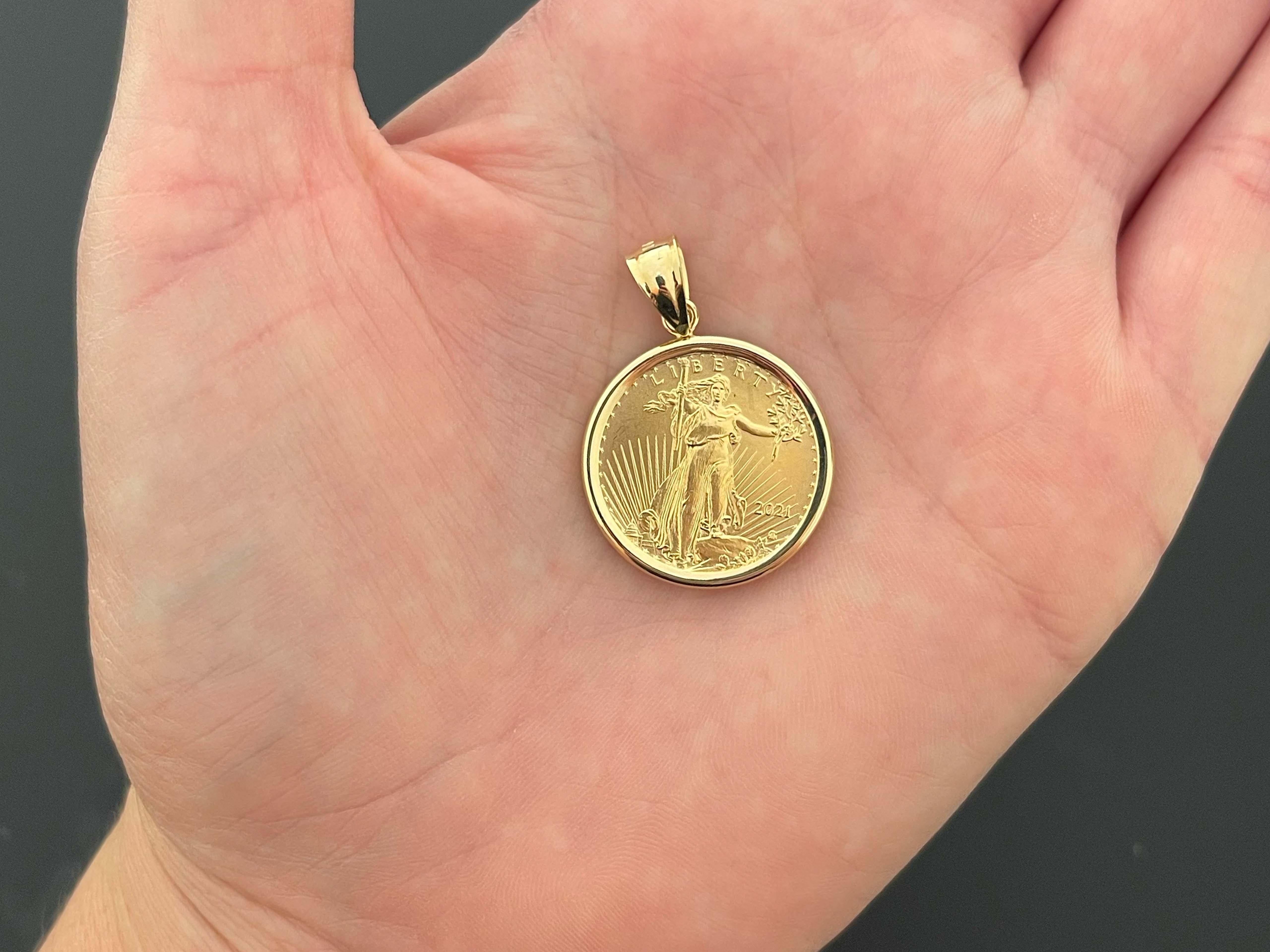 This pendant contains one $10 American Eagle gold coin with 1/4 ounce of pure gold. The coin is set in a 14K gold bezel. The pendant is ~22.75 mm in diameter and the bail measures 10.5 mm tall. The total weight of the pendant is 10 grams.