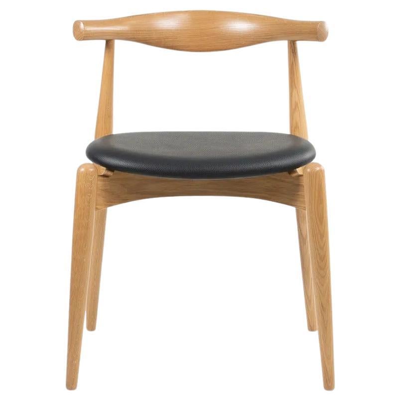 Chaise de salle à manger CH20 de Hans Wegner pour Carl Hansen en chêne laqué 2021 en vente