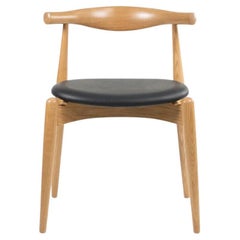 2021 CH20 Elbow Dining Chair by Hans Wegner for Carl Hansen in Lacquered Oak