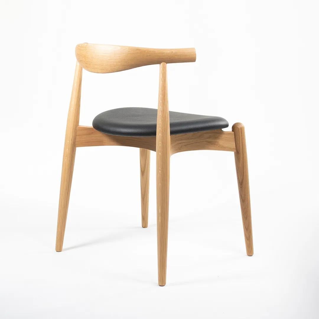 2021 CH20 Elbow Dining Chair by Hans Wegner for Carl Hansen in Oak & Leather In Good Condition For Sale In Philadelphia, PA