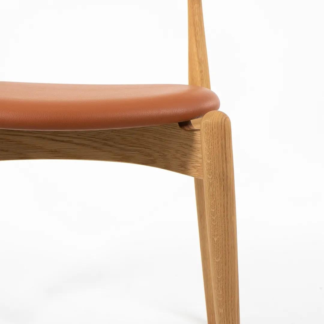 Chaise de salle à manger CH20 de Hans Wegner pour Carl Hansen en chêne et cuir brun clair 2021 en vente 1