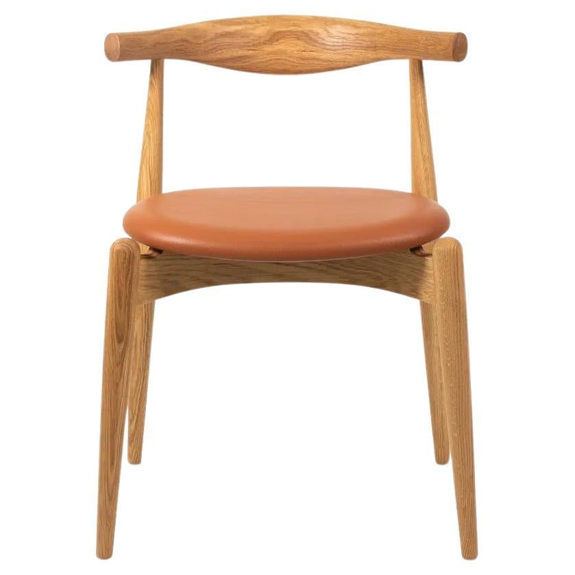 2021 CH20 Elbow Dining Chair by Hans Wegner for Carl Hansen in Oak & Tan Leather For Sale