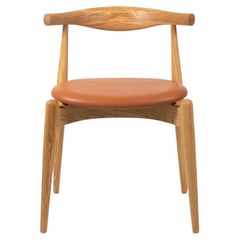 Chaise de salle à manger CH20 de Hans Wegner pour Carl Hansen en chêne et cuir brun clair 2021