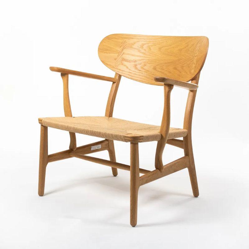 Danish 2021 CH22 Lounge Chair by Hans Wegner for Carl Hansen in Oak Natural w/ Cord