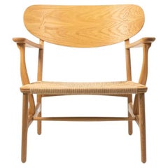 2021 CH22 Lounge Chair by Hans Wegner for Carl Hansen in Oak Natural w/ Cord