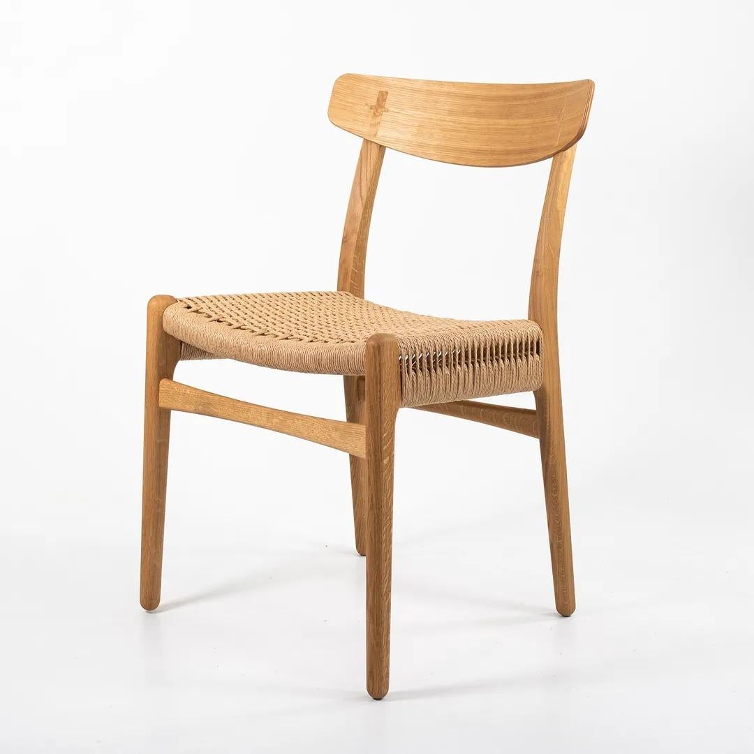 2021 CH23 Dining Chair by Hans Wegner for Carl Hansen in Oil Oak and Paper Cord In Good Condition For Sale In Philadelphia, PA