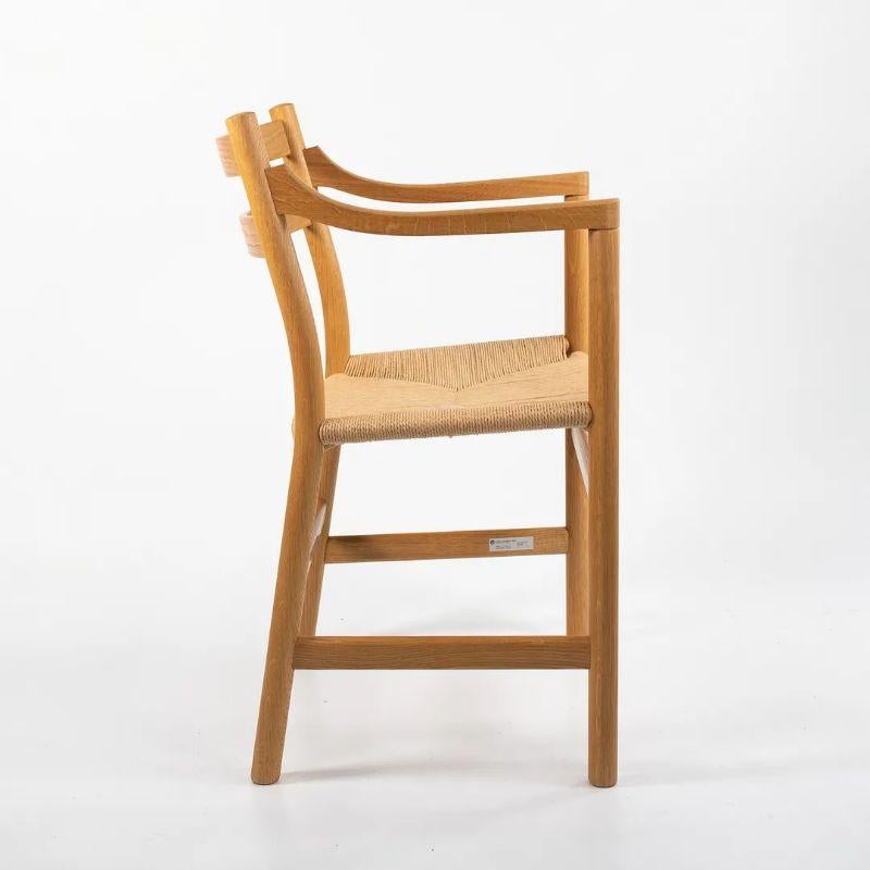 2021 CH46 Dining Chair by Hans Wegner for Carl Hansen in Oil Oak with Paper Cord In Good Condition For Sale In Philadelphia, PA