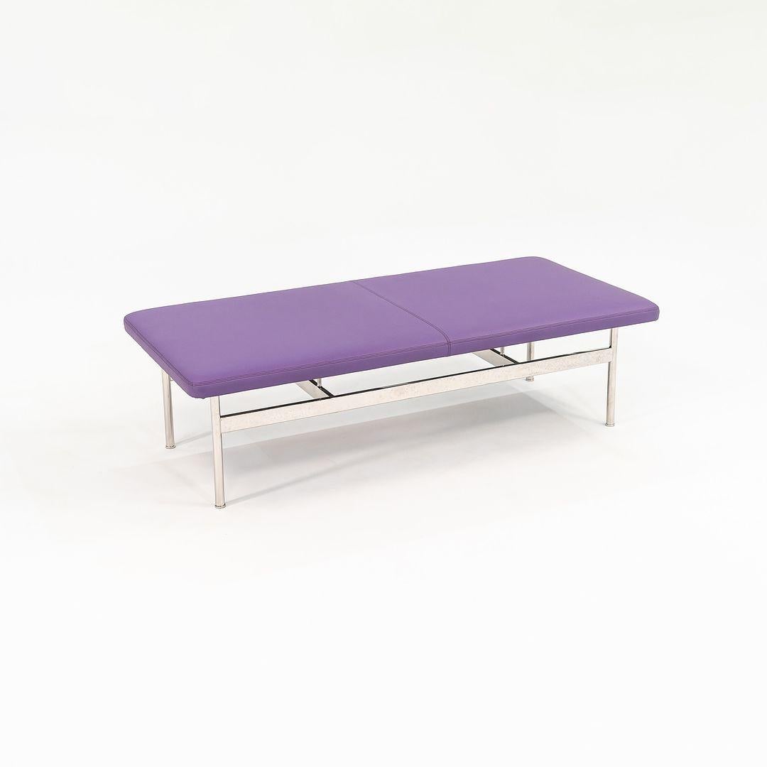 This is a CP.2 Two-Seat Bench, designed by Charles Pollock for Bernhardt Design in 2013. These benches date to 2021. The listed price includes one bench, and we have two available for purchase. The design includes a polished stainless-steel base,