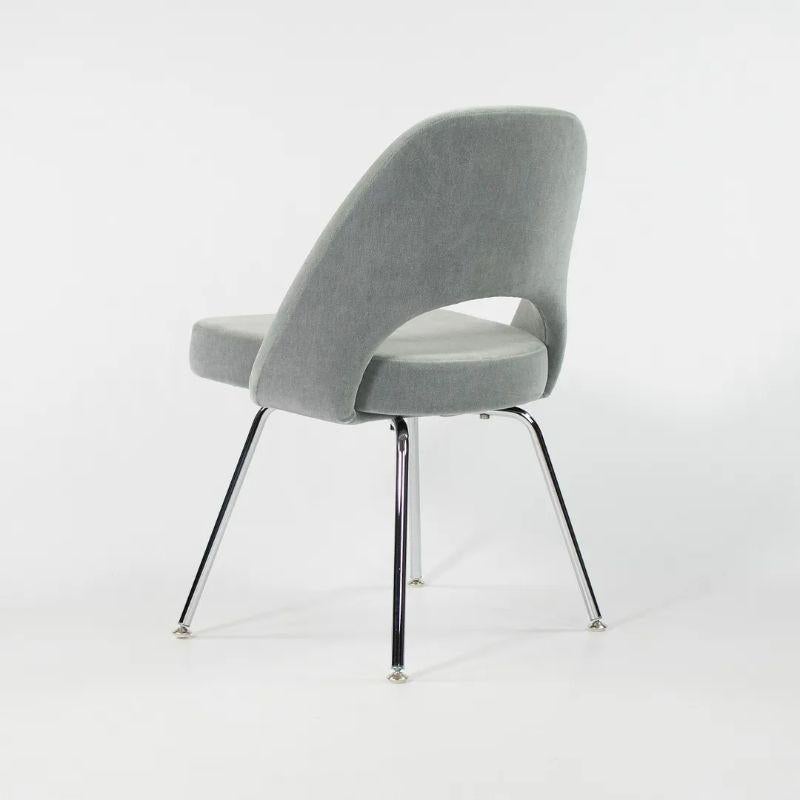 Listed for sale is a single 2021 production Eero Saarinen for Knoll armless executive side / dining chair in what appears to be Knoll Velvet textile in the color Swan (not guaranteed, but appears to be that or similar). This example was acquired